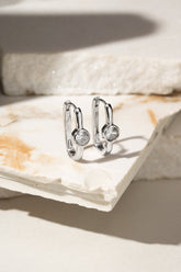 Brinco Argola Oval com ponto em Zircônia Branca