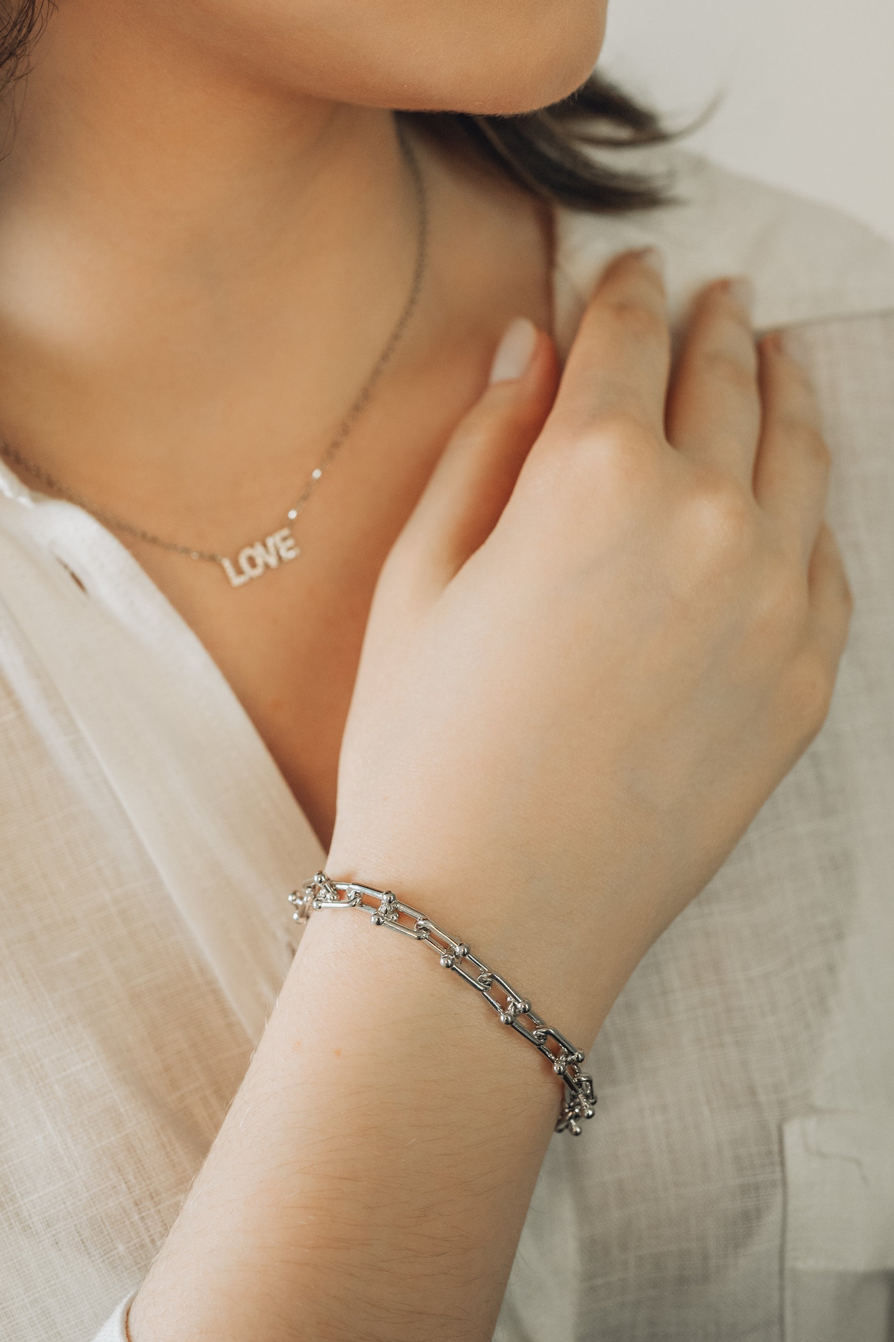 Pulseira Elos ovais com bolinhas em banho de ródio